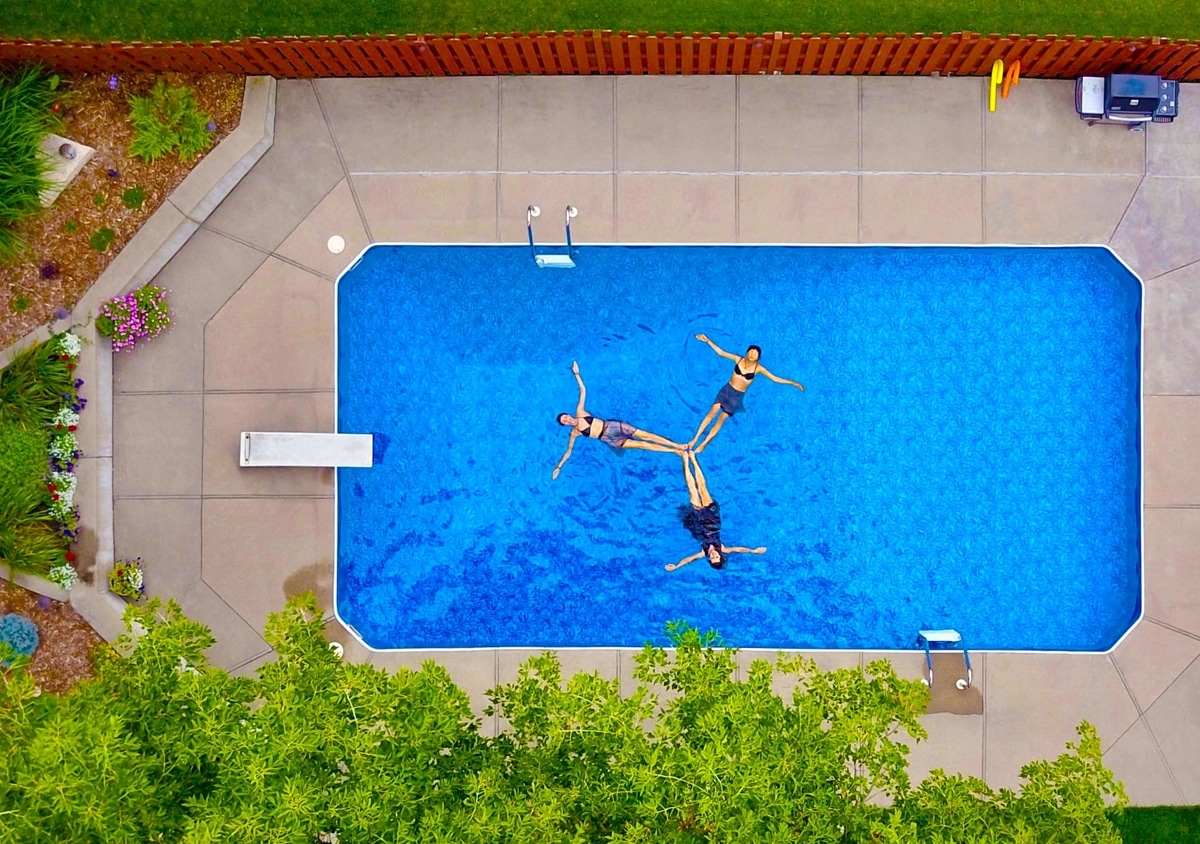backyard pool swimmers